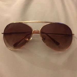 Aviator sunglasses. Good hardware brown lenses.